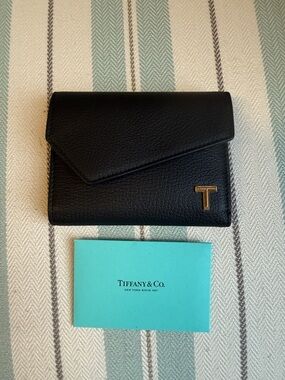 Tiffany & Co. Black Leather Compact Wallet with Gold T Accent